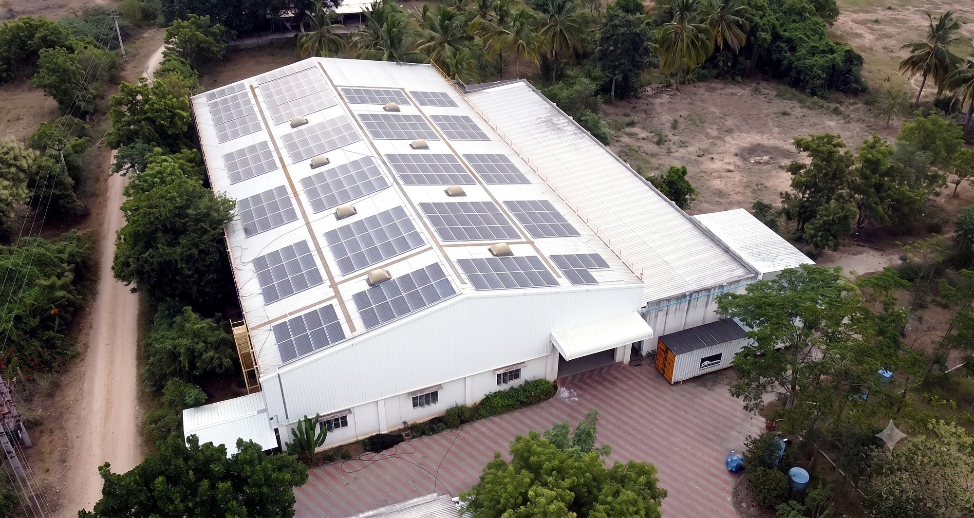 Aerial view of the Greendrops factory with rooftop solar